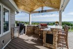 Outdoor Kitchen with island and seating